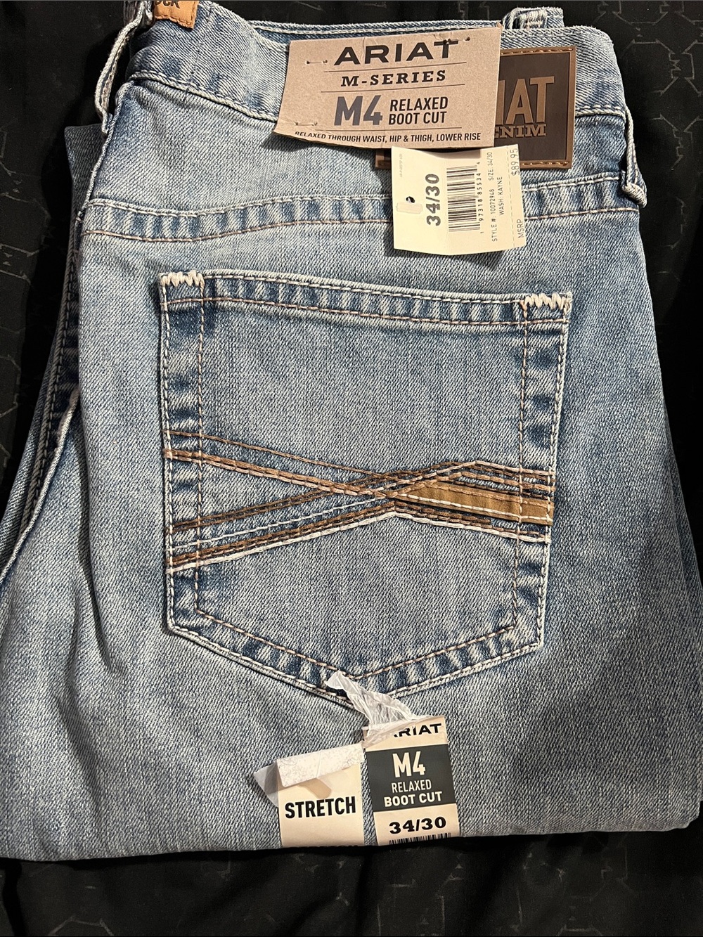 Ariat M4 Relaxed Boot Cut Jeans in Light Denim with Brown Stitching